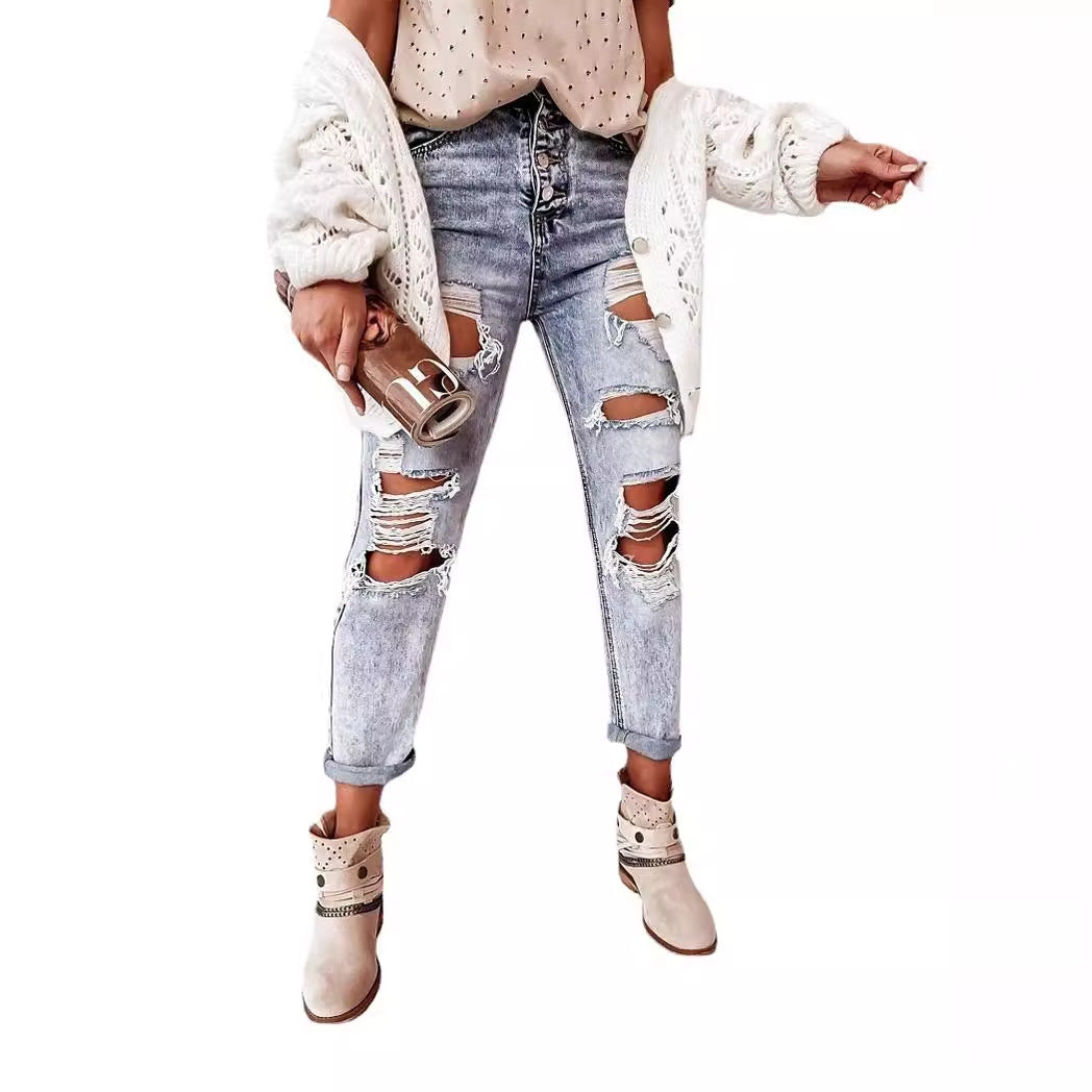 Boyfriendjeans dam med hög midja och knappgylf | Kraftigt slitna med revor | Uppvikta ben | Ljusblå med vintagekänsla