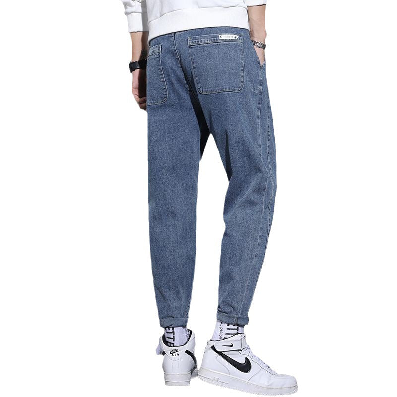 Jeans herr med resår i midjan | Ledig passform med avsmalnande ben | Sneda framfickor och tydliga sömmar