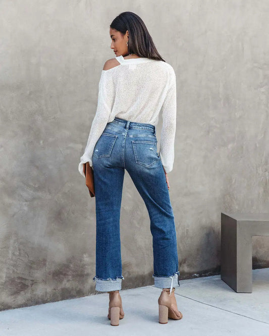 Jeans dam med hög midja och asymmetrisk knäppning | Rak passform i ankellängd | Uppvikta fållar med råkant