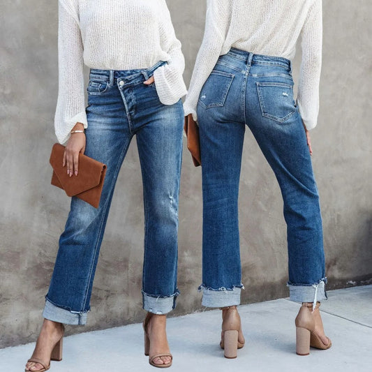 Jeans dam med hög midja och asymmetrisk knäppning | Rak passform i ankellängd | Uppvikta fållar med råkant