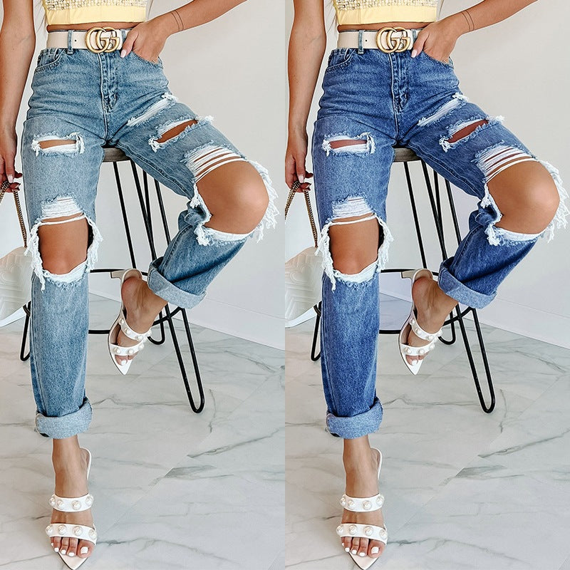 Boyfriendjeans dam med stora revor | Mellanhög midja | Uppvikta benslut | Avslappnad passform