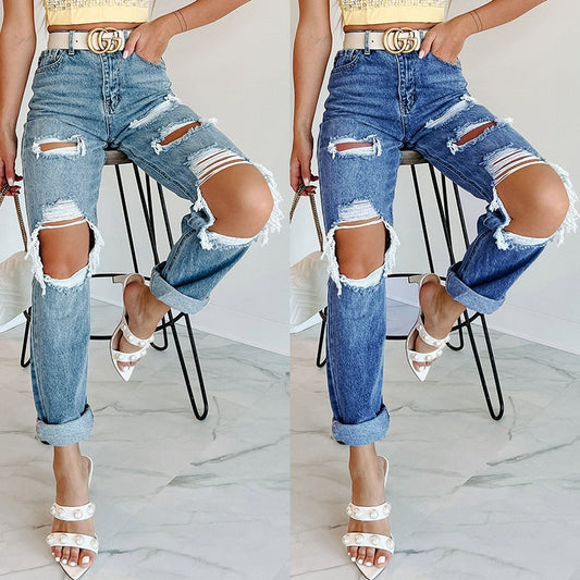 Boyfriendjeans dam med stora revor | Mellanhög midja | Uppvikta benslut | Avslappnad passform