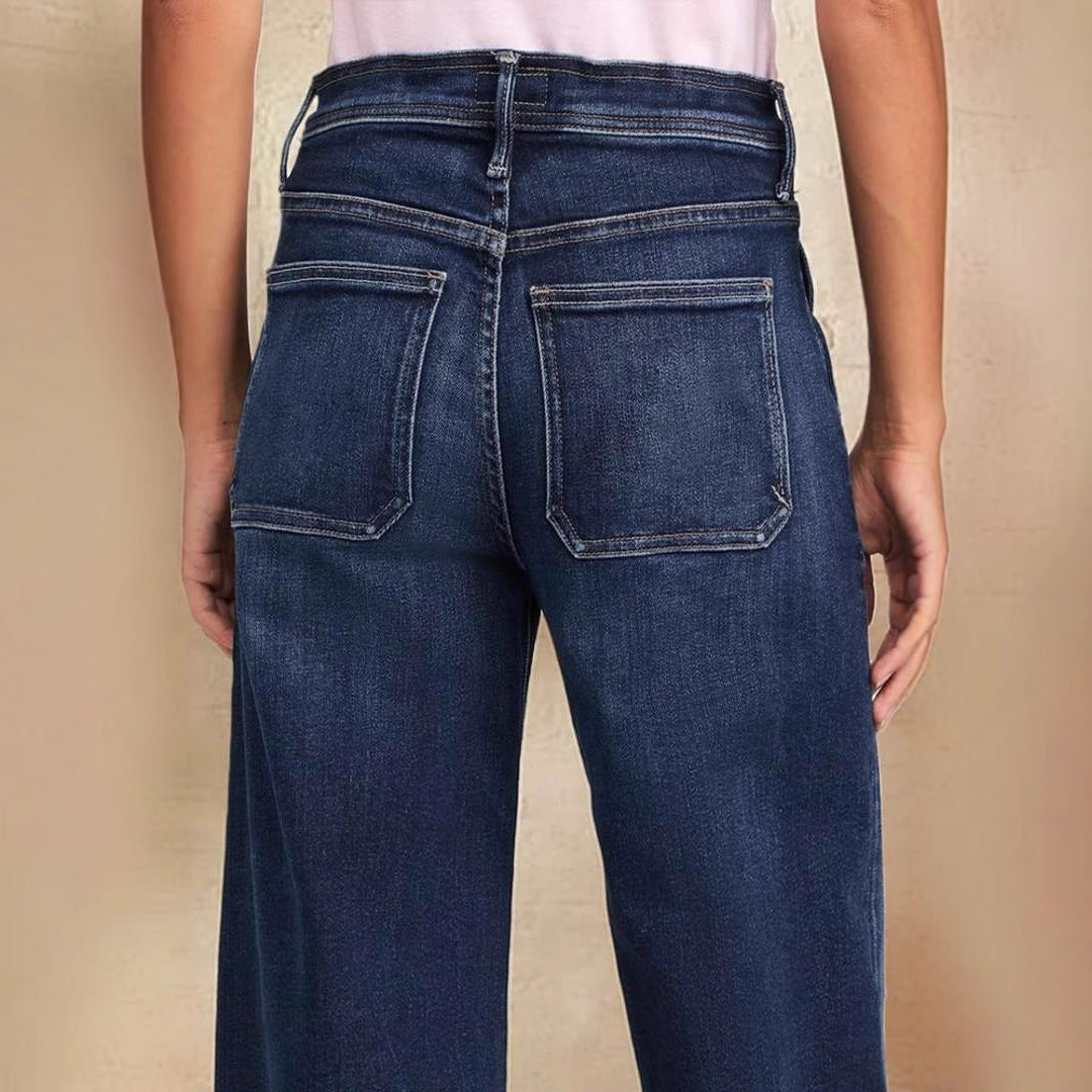 Mörkblå jeans dam med extra vid benlinje
