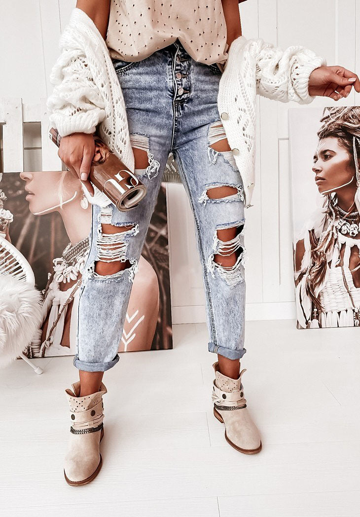 Boyfriendjeans dam med hög midja och knappgylf | Kraftigt slitna med revor | Uppvikta ben | Ljusblå med vintagekänsla