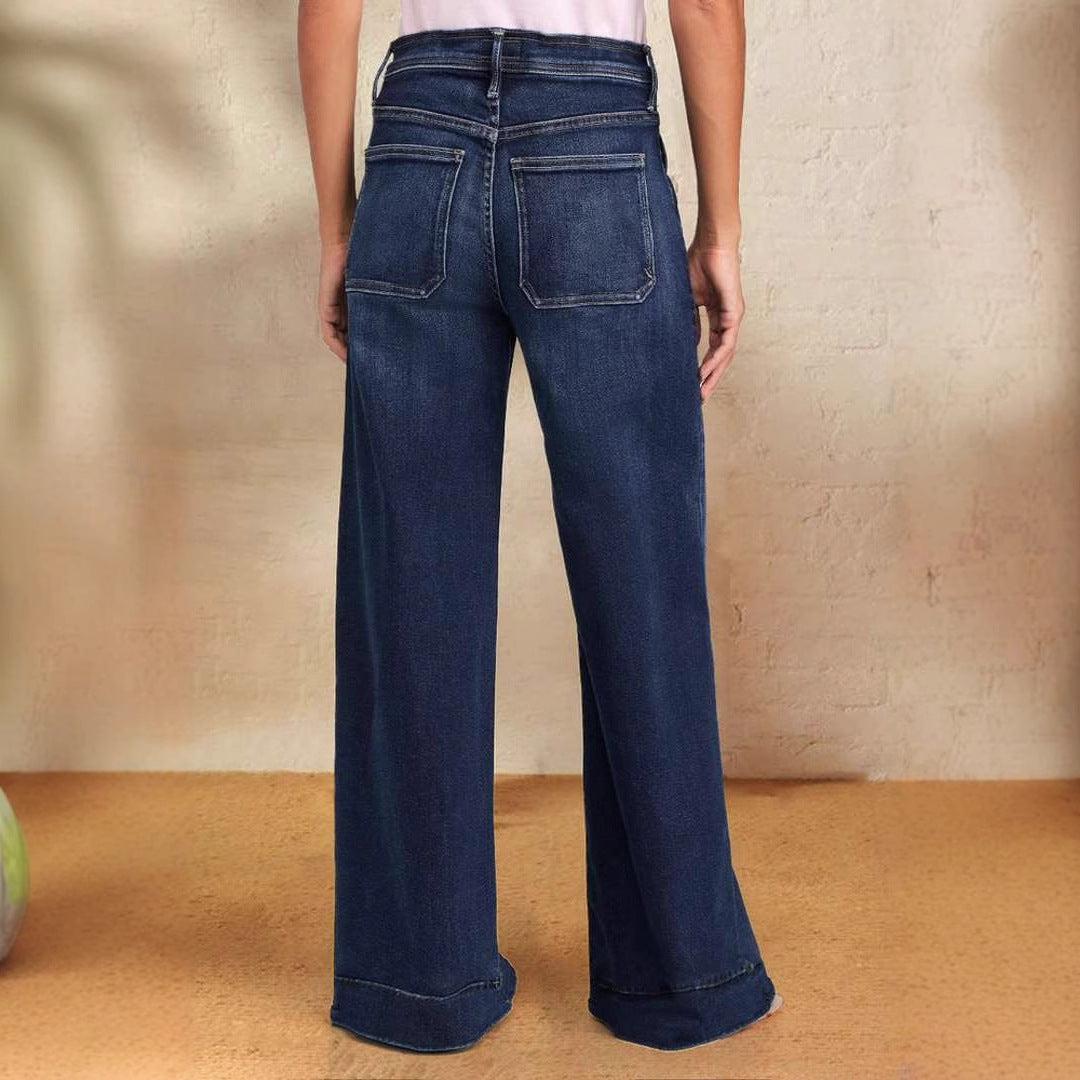 Mörkblå jeans dam med extra vid benlinje