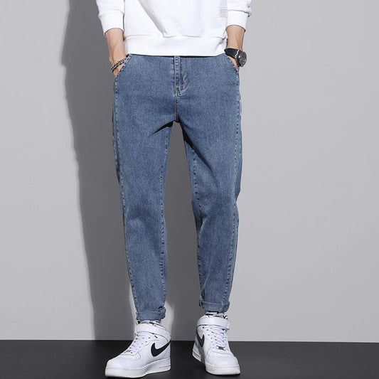 Jeans herr med resår i midjan | Ledig passform med avsmalnande ben | Sneda framfickor och tydliga sömmar