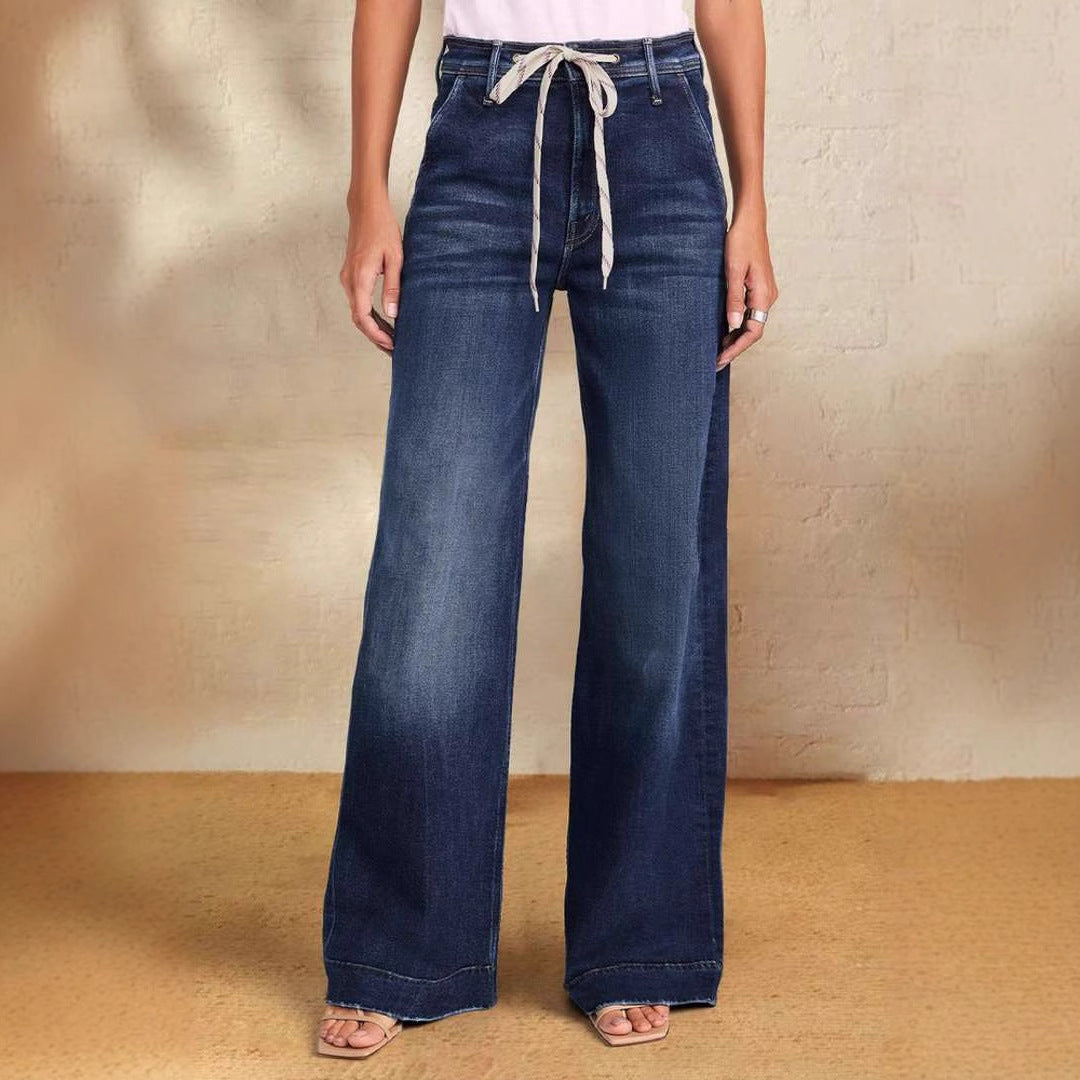 Mörkblå jeans dam med extra vid benlinje