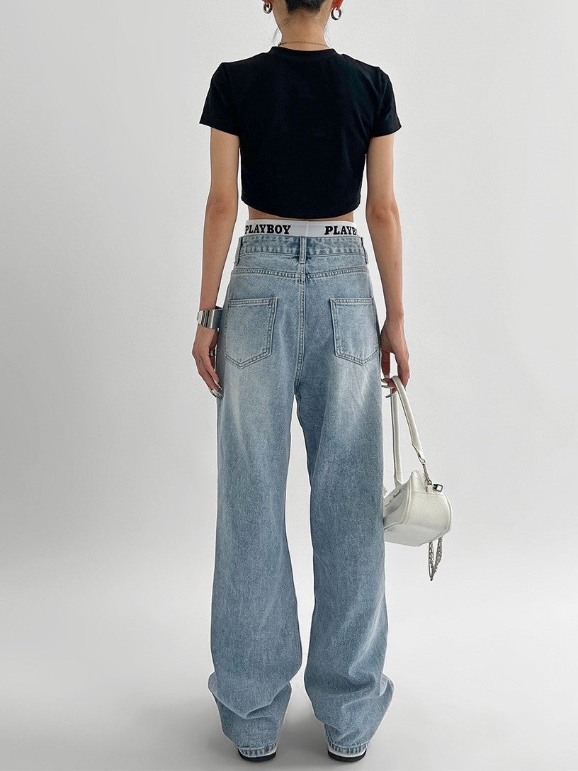Ljusblå raka jeans dam med revor på knän och lår