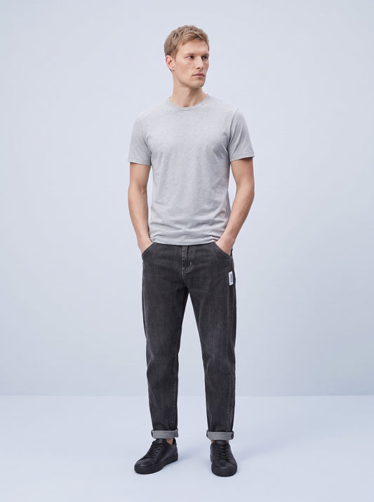 Jeans herr med resår i midjan | Ledig passform med avsmalnande ben | Sneda framfickor och tydliga sömmar